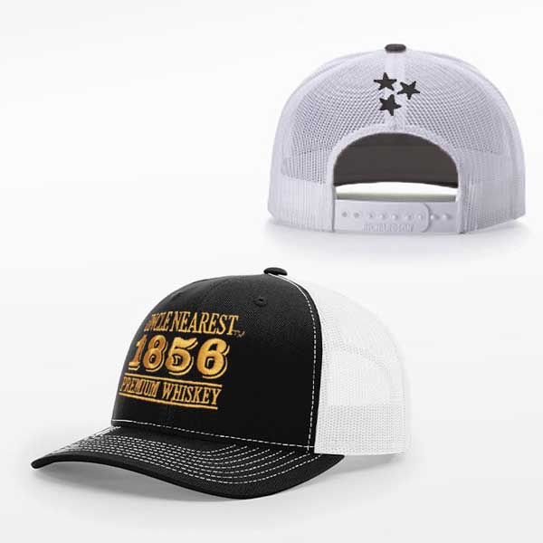 Black panel trucker hat with white mesh and UN 1856 logo on front